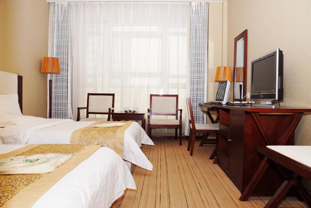 Datong Jinhe Kailong Hotel Номер фото