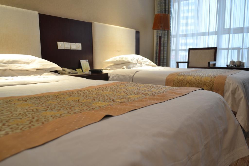 Datong Jinhe Kailong Hotel Номер фото